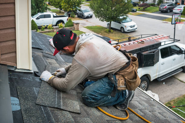 Professional Roofing technician working in Milford, MI
